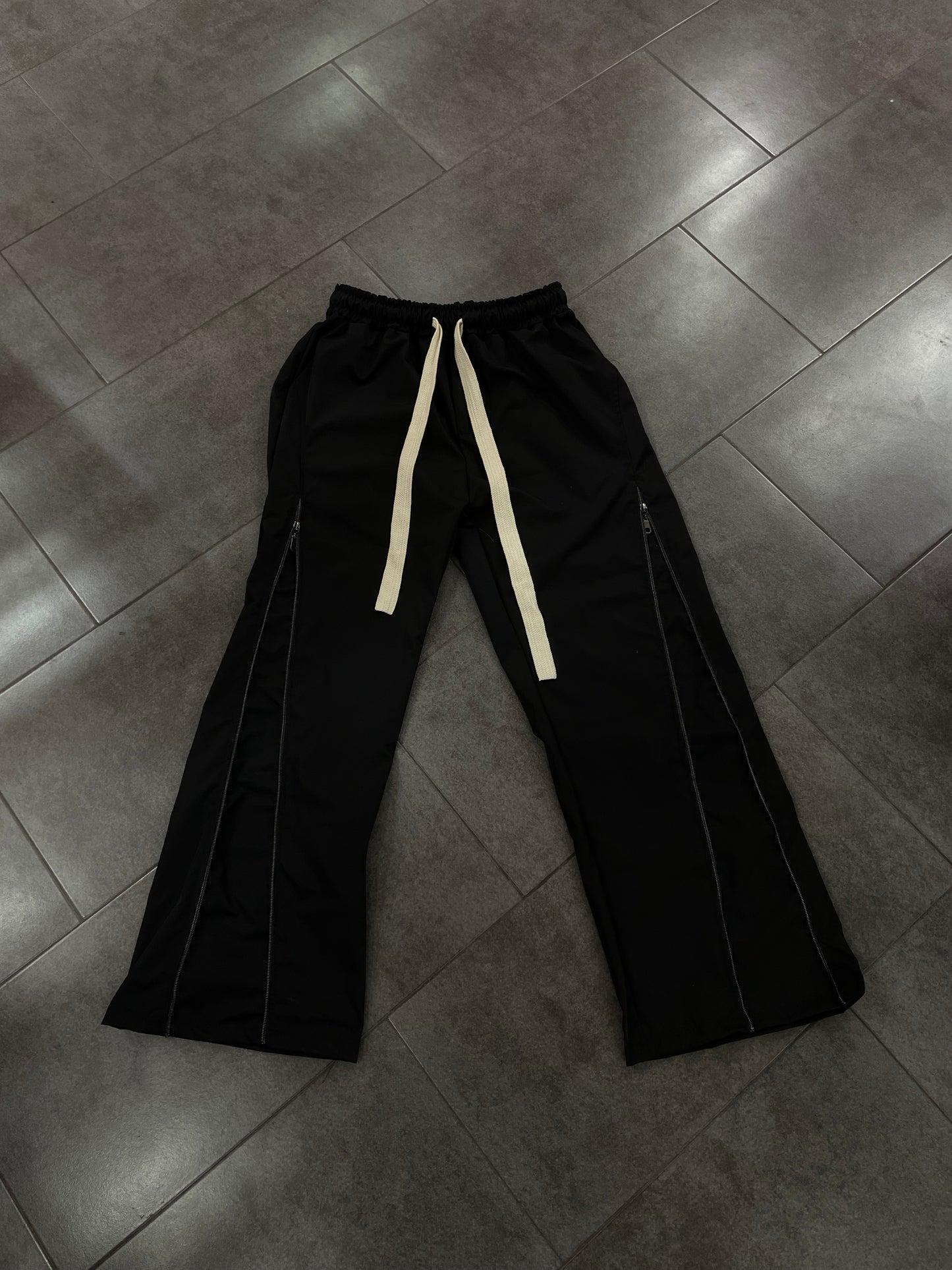 pantalone zip