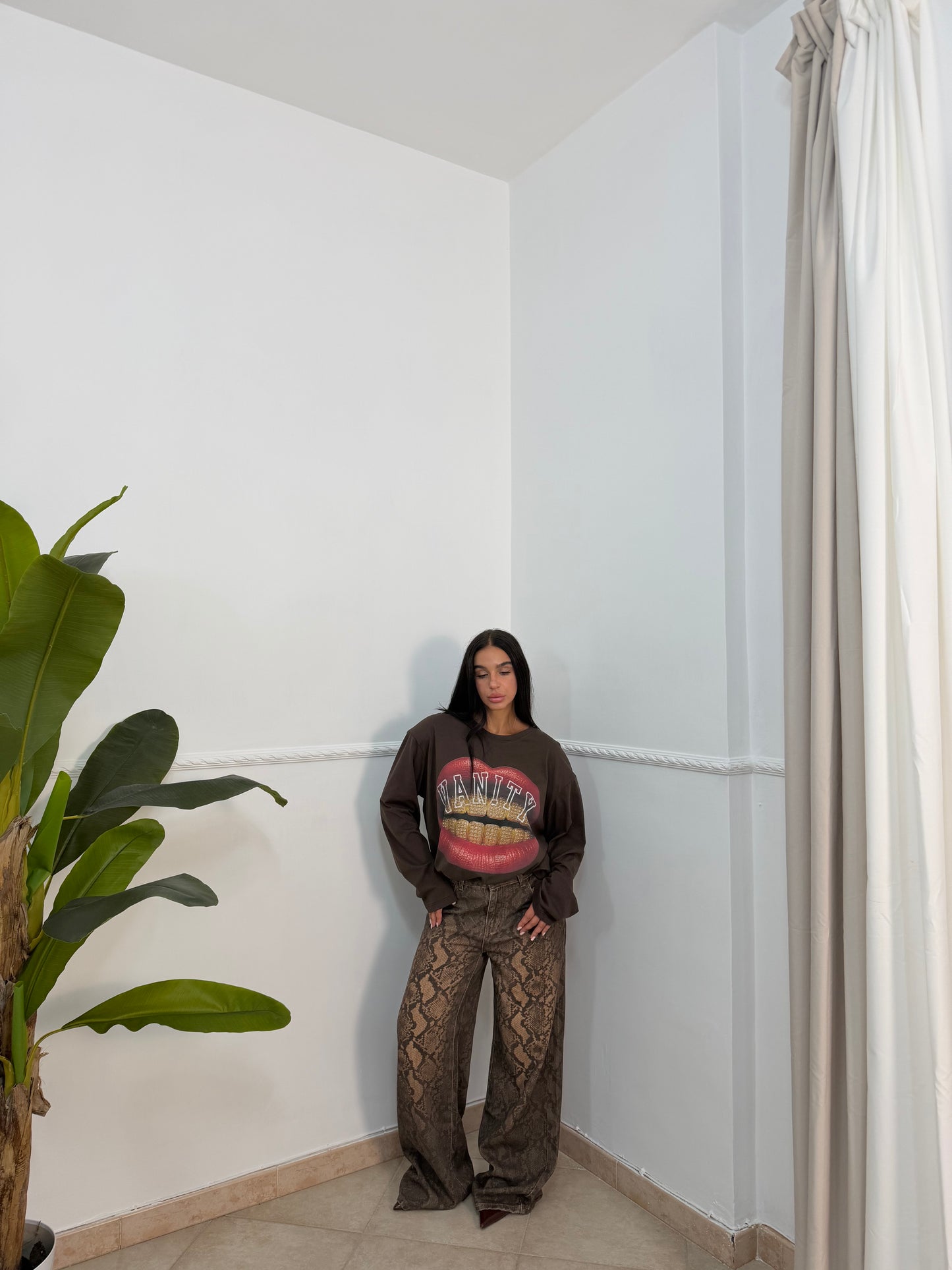 Jeans palazzo pitone