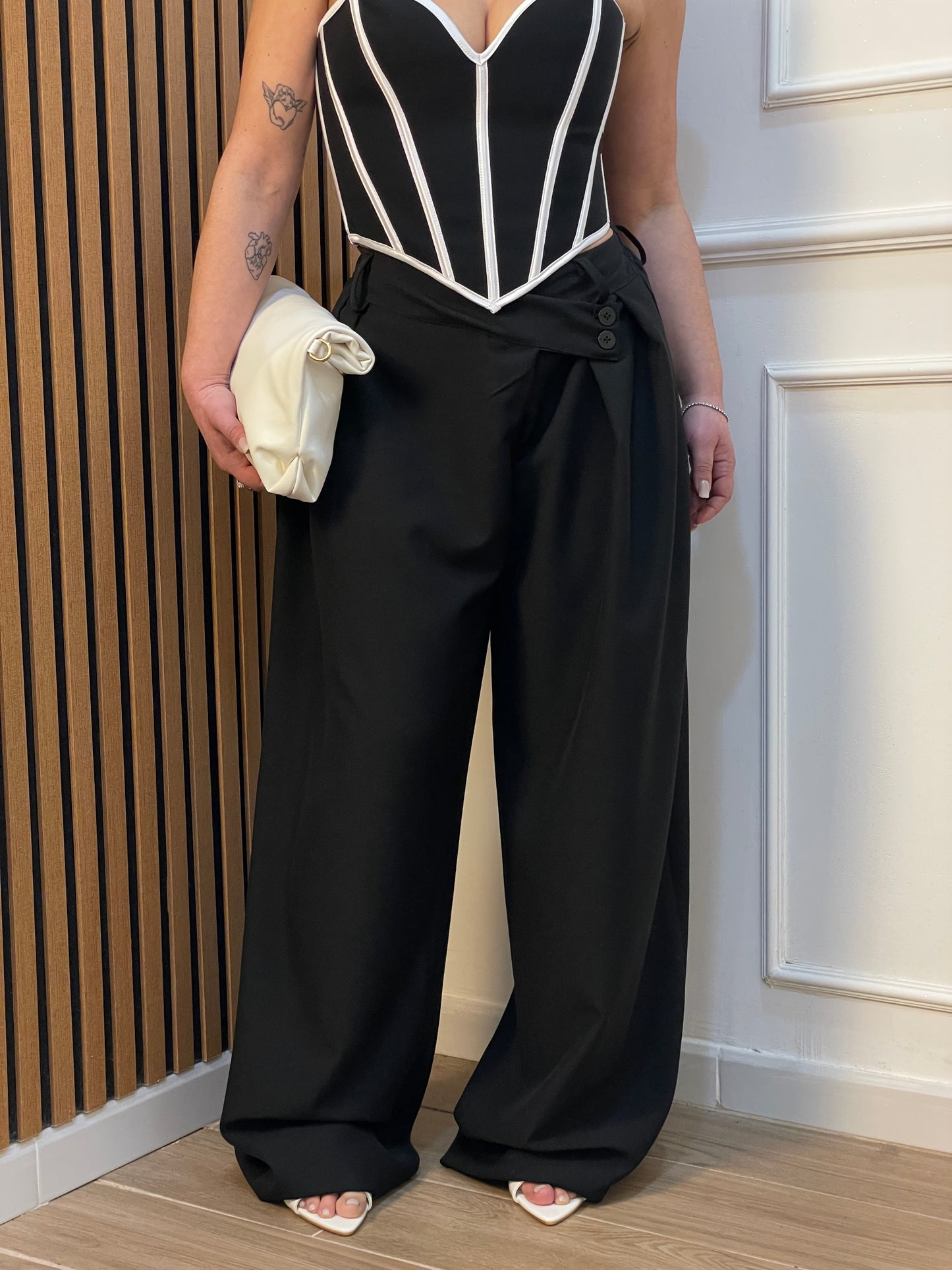 Pantalone chiusura asimmetrica