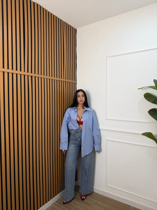 Jeans bustino asimmetrico