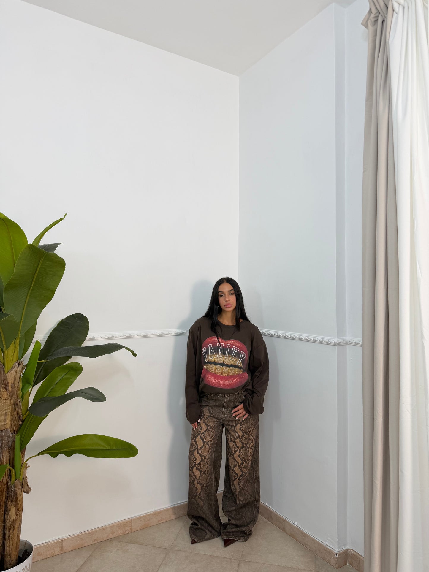 Jeans palazzo pitone