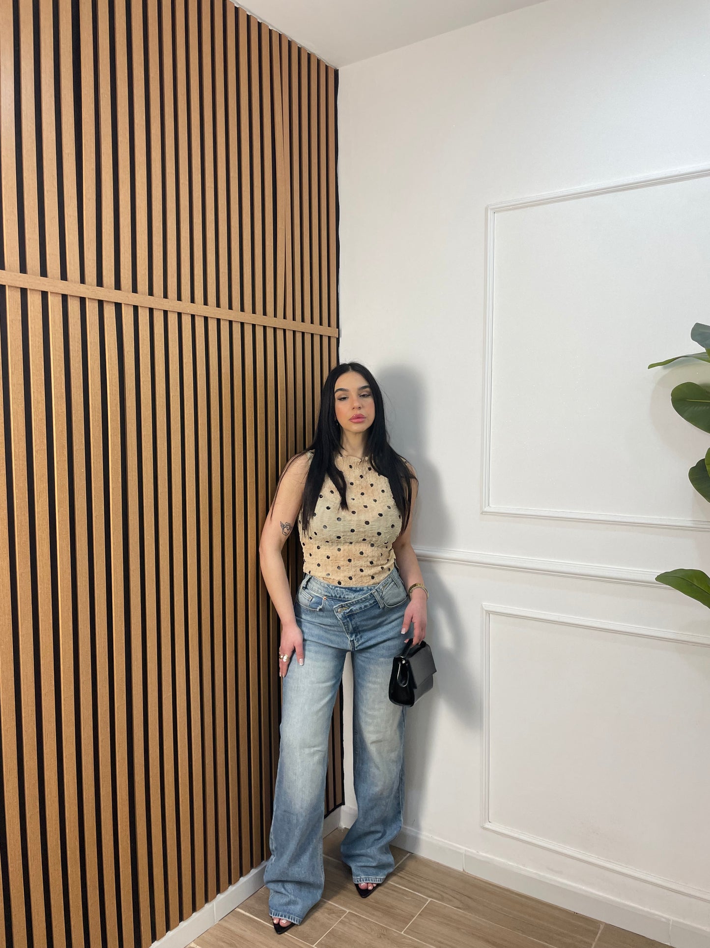 Jeans bustino assimetrico