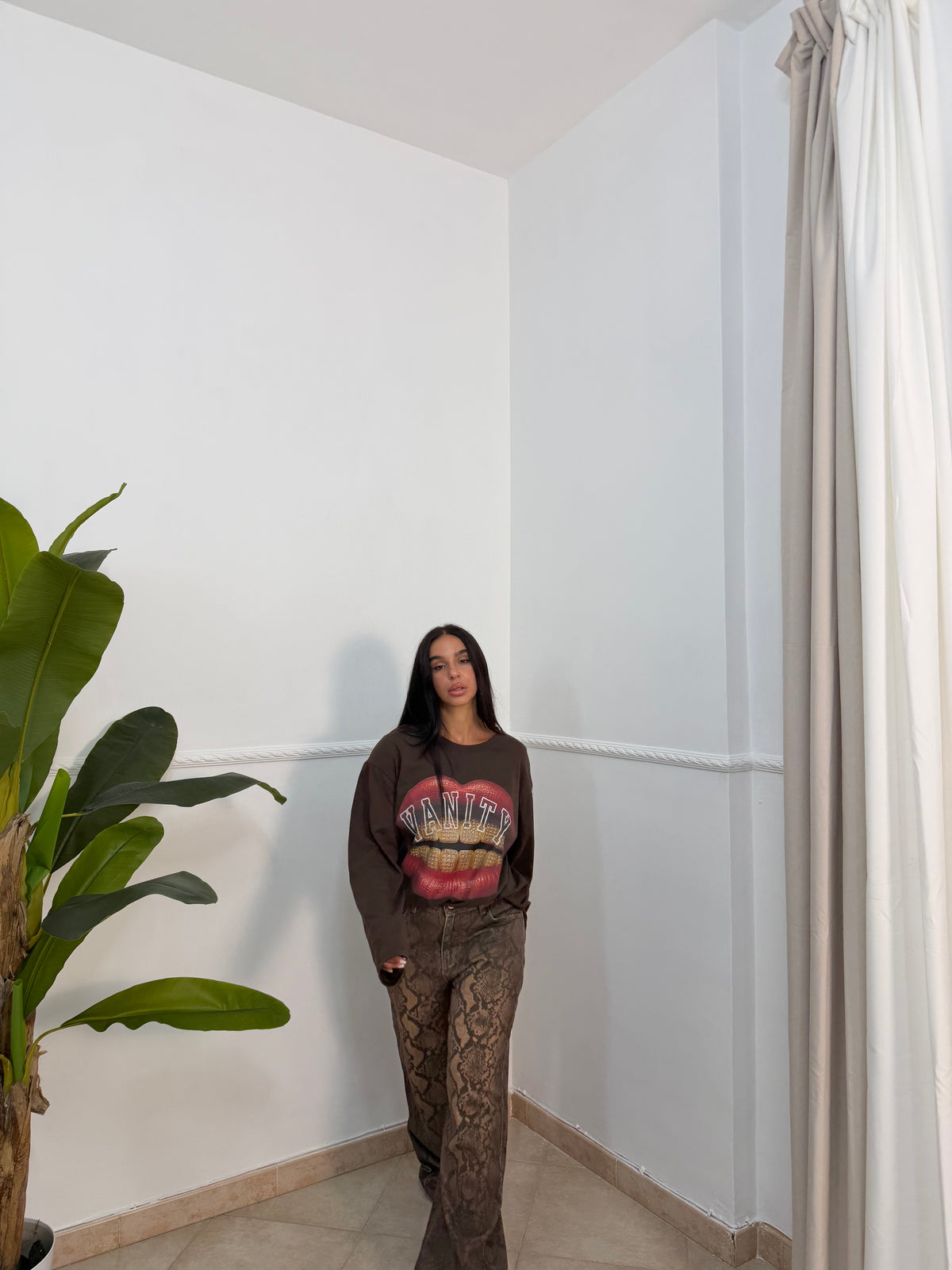 Jeans palazzo pitone